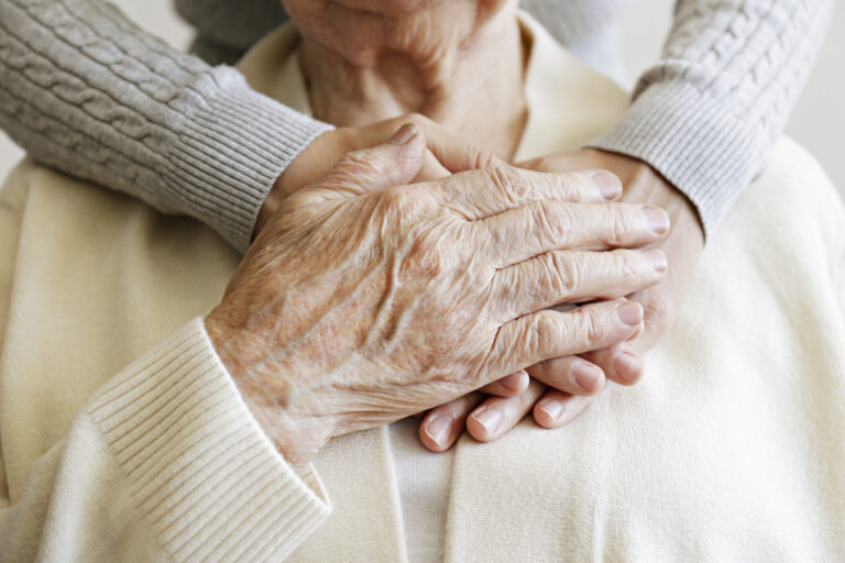 Cropped shot of elderly female's hands